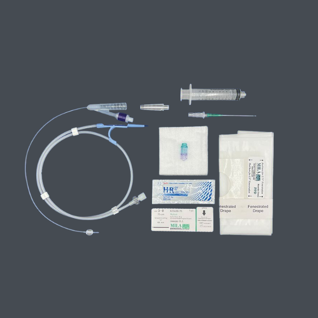 Medical supply kit with IV catheter, extension tubing, syringe, and sterile dressings arranged on a dark background, ready for use