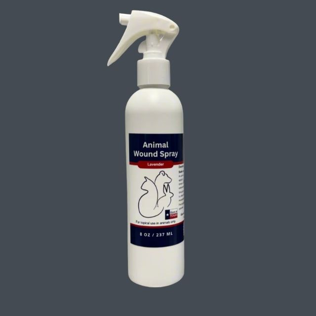 White spray bottle labeled Animal Wound Spray Lavender, for topical use on animals.